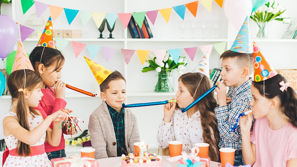 Our collection features a wide range of festive items, including colorful birthday banners and adorable birthday hats. 