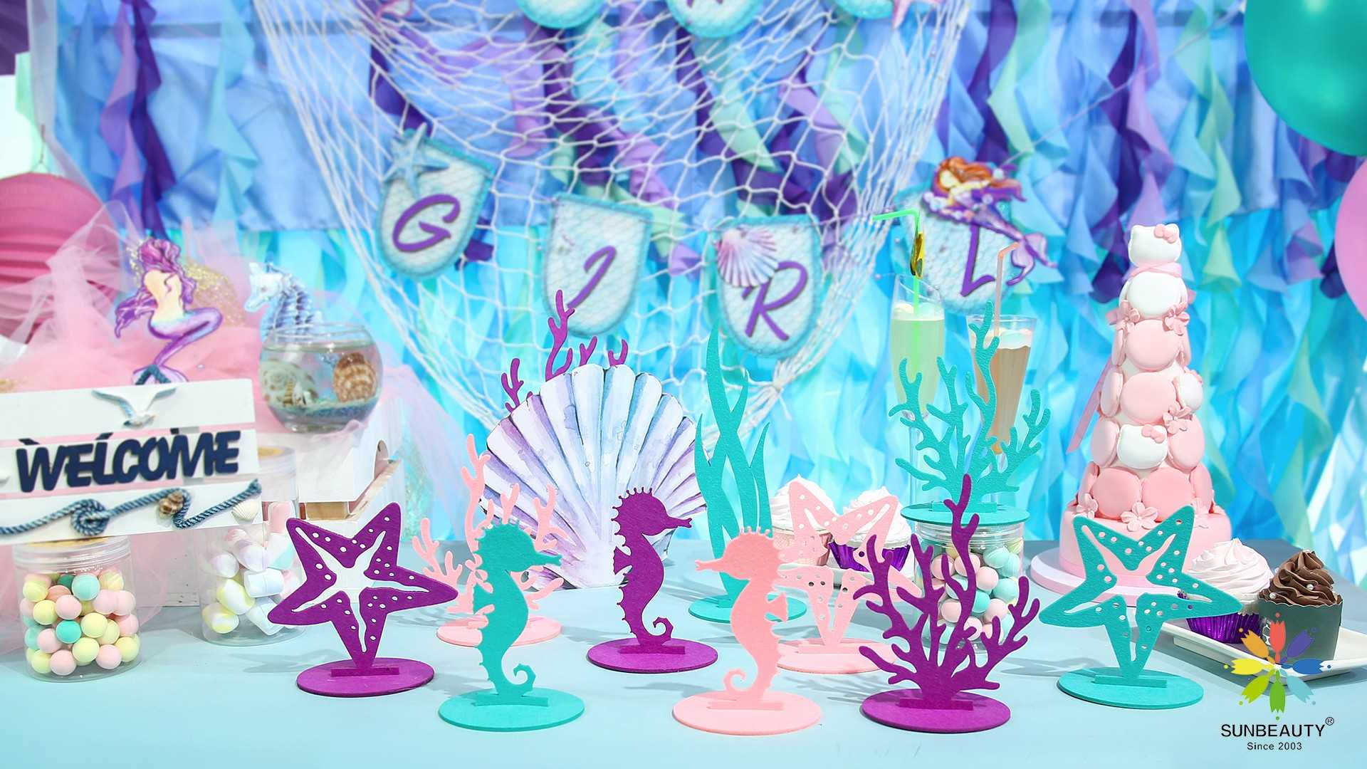 A set of felt table centerpieces in a mermaid theme.