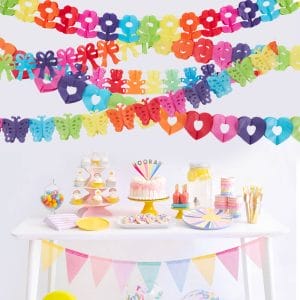 colorful paper decorations with paper garland and table decorations