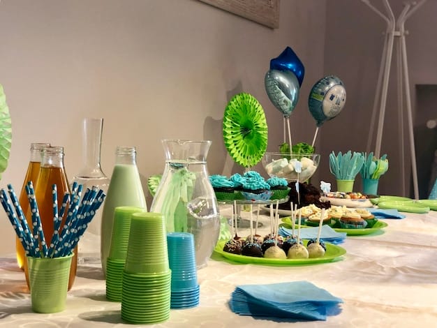 Close-up of bottles and sweet food on table party tableware set