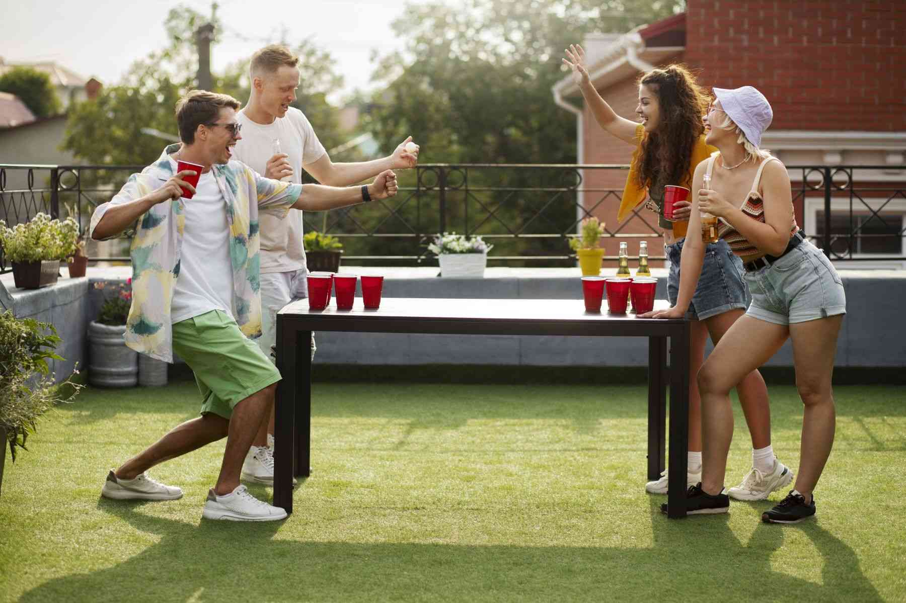 full-shot-friends-playing-beer-pong