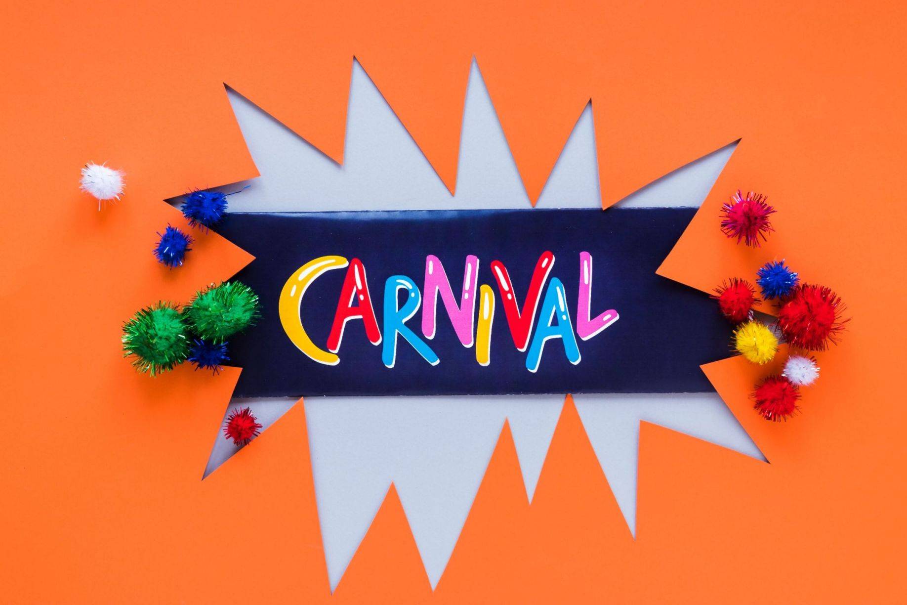 carnival paper cut out with colorful pom poms