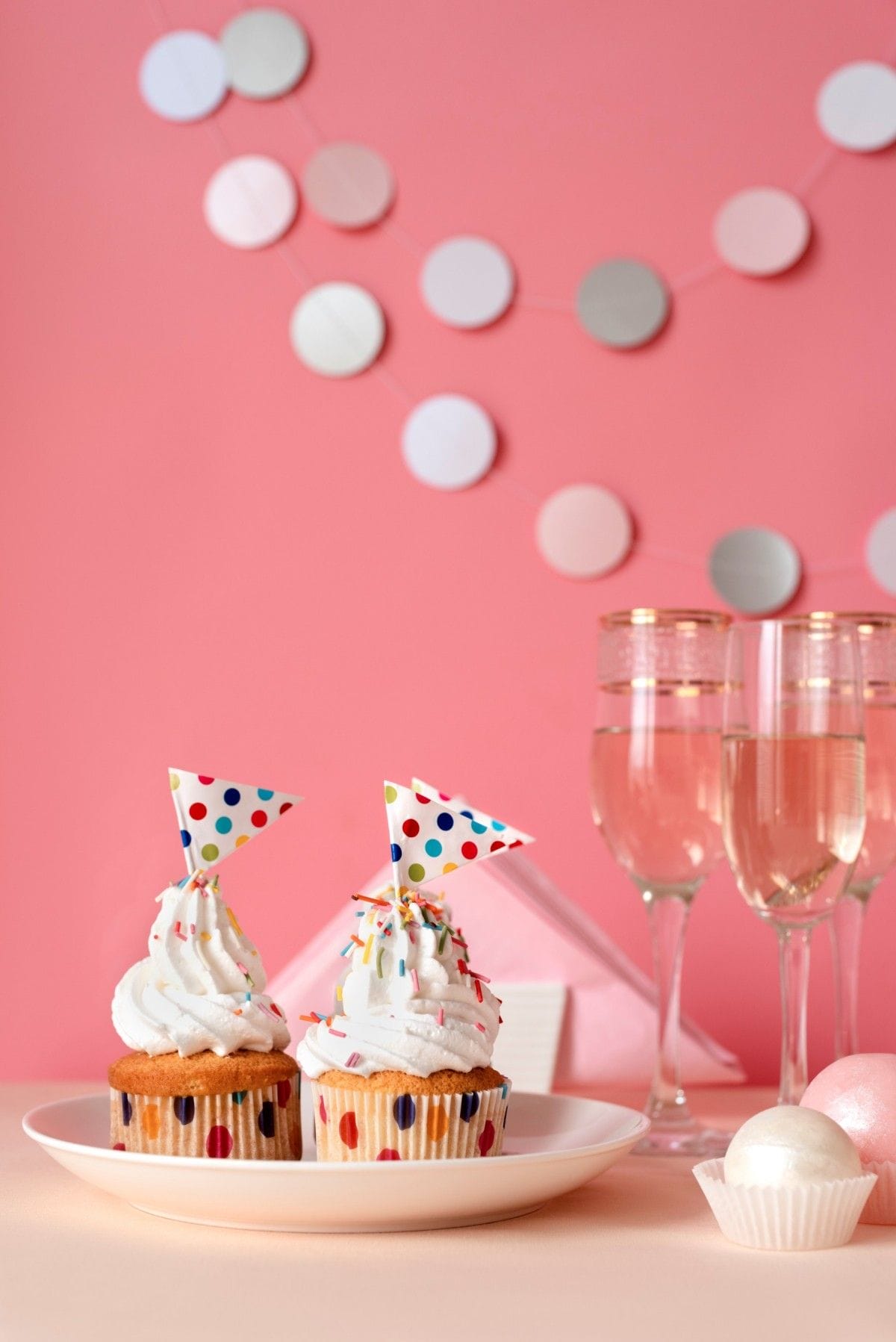 Near-Luminous Pink table-arrangement-birthday-event-with-cupcakes-glasses-champagne