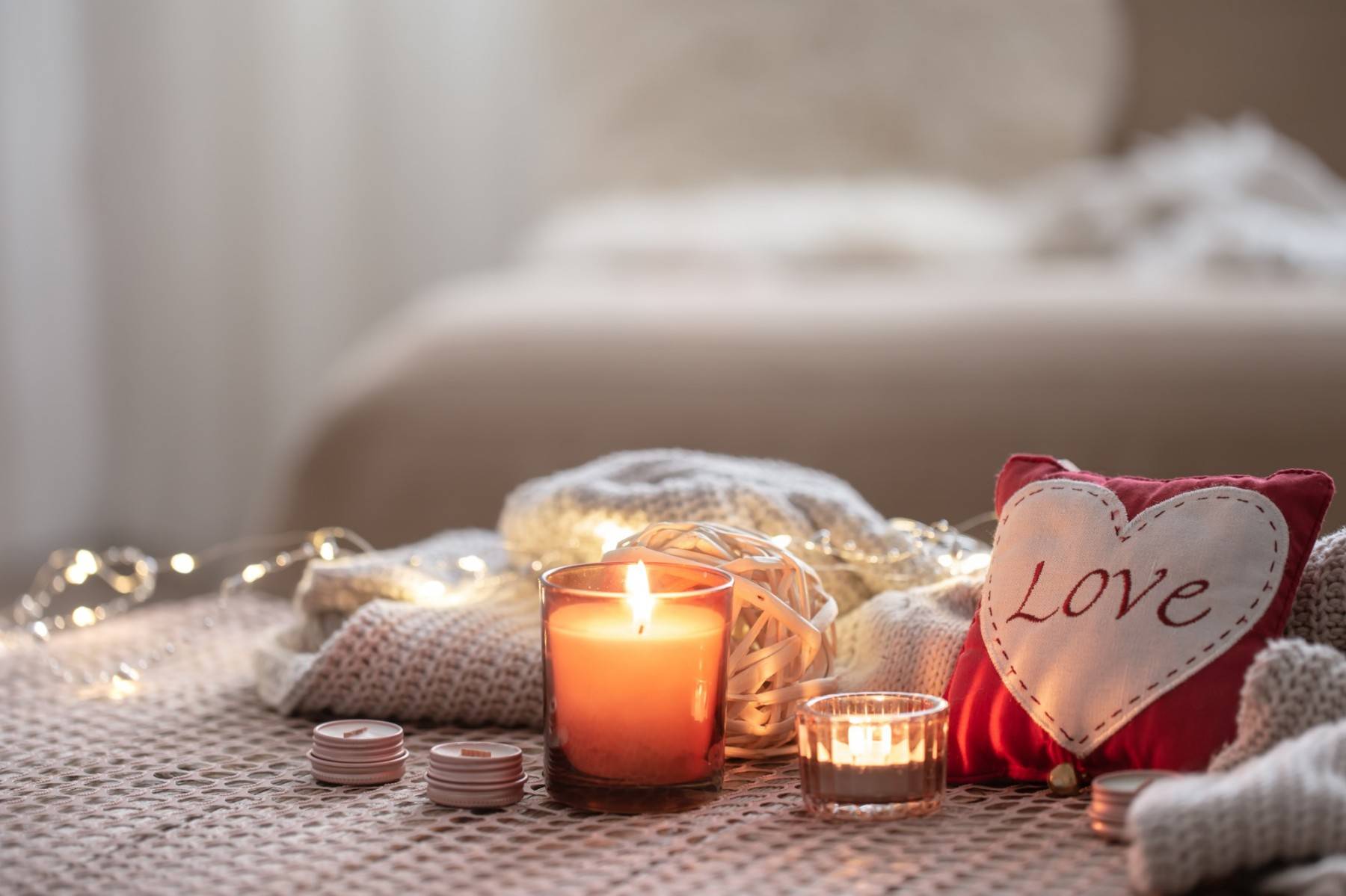 cozy valentines day background with candle decorative heart