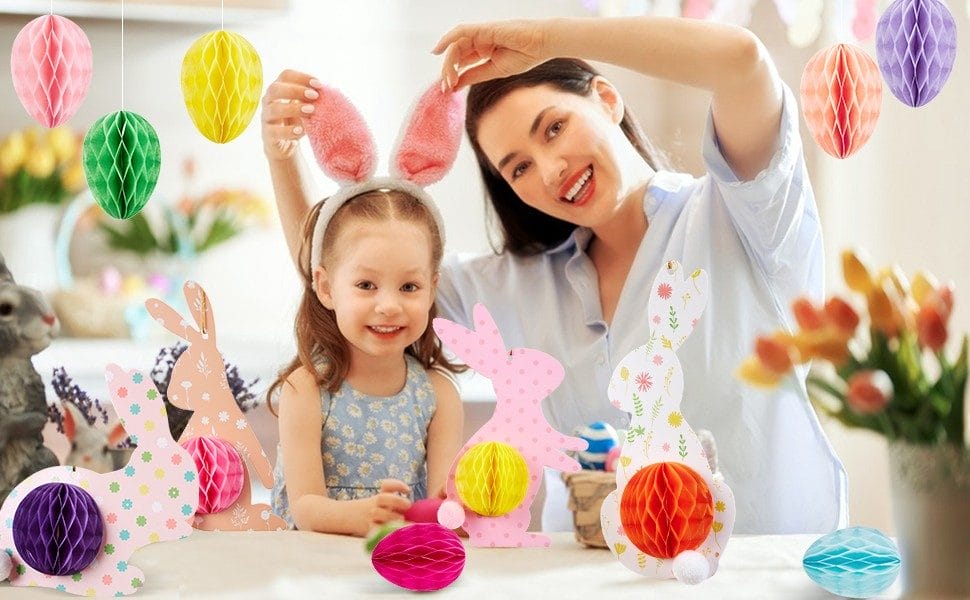 Family enjoying Easter craft setup with paper bunnies and honeycomb eggs
